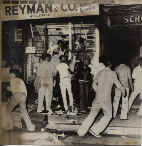 1974 original wire photo of youth looting in Baltimore after a police walkout