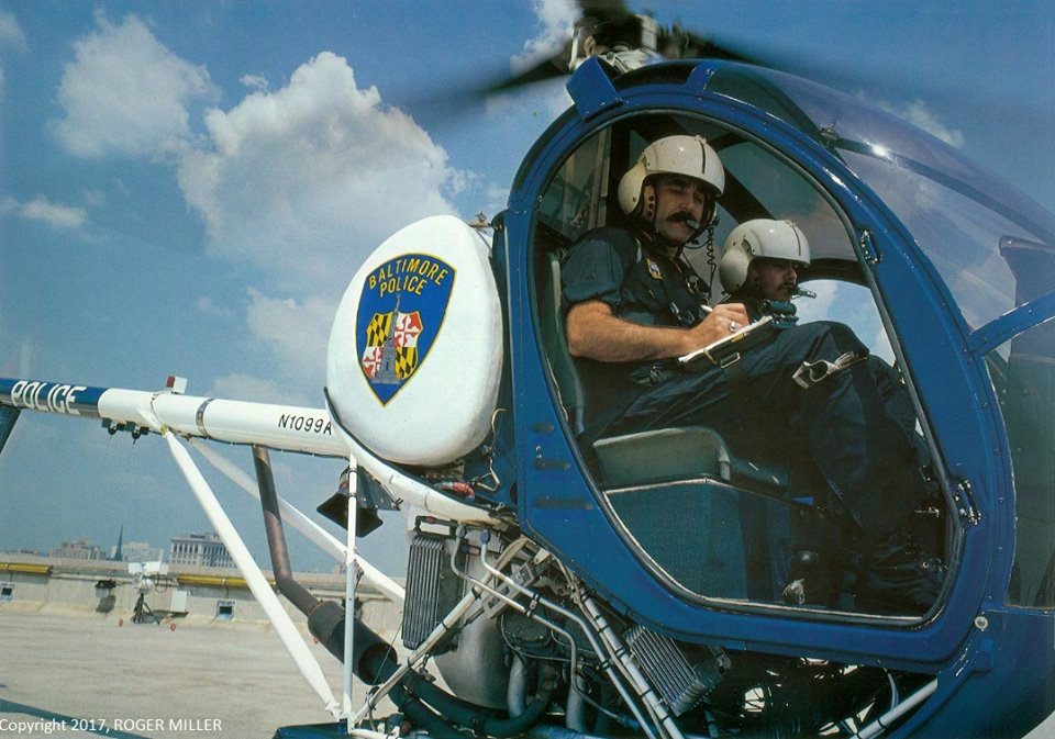 Roger Miller took this photo of Officer Robert Foltz and Flight Officer Douglas Womack in Foxtrot for his 1983 book Baltimore A Portrait