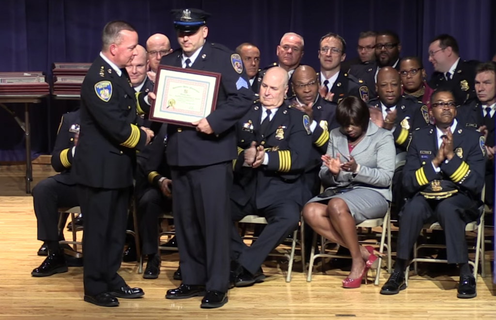 Wayne Jenkins receiving the Bronze Star for helping fellow officers during the 27 Apr 2015 rioting